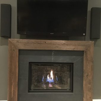 3-sided-barn-beam-fireplace-with-slate-tiles-close-up